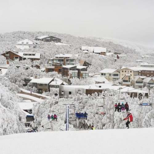 A view of a ski lift and resort lodging at Mt. Buller in Victoria, Australia.