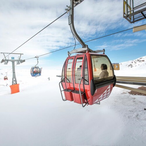 A couple on a gondola at Valle Nevado resort in Chile.