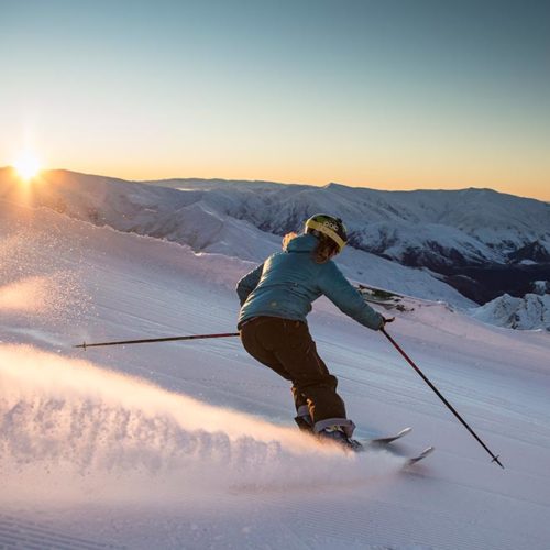 A Mountain Collective skier carving on-piste at Coronet Peak + The Remarkables in New Zealand.